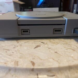 Sony PlayStation Classic in Gray with controller and cords